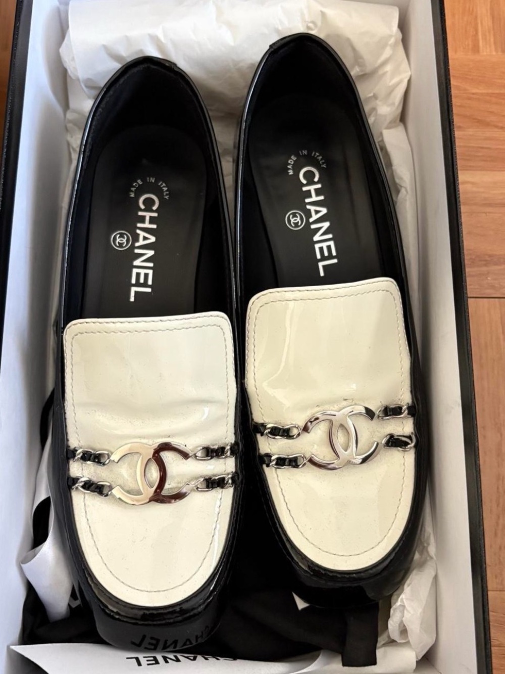CHANEL Two-Tone Patent Leather Loafers in Black and Cream with CC Hardware